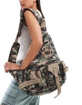 Minga London denim sling cross body bag in camo fB[X