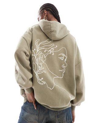 Reclaimed Vintage sketchy face hoodie in khaki fB[X