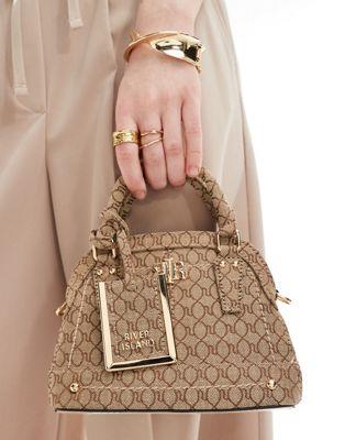 o[ACh River Island monogrammed mini bag in beige fB[X