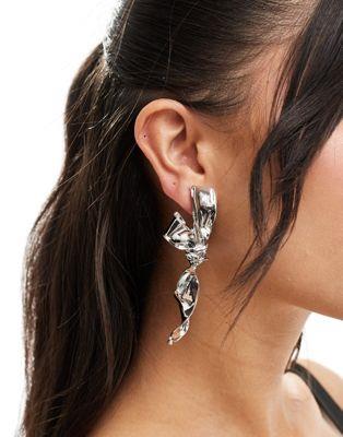 エイソス エイソス ASOS DESIGN Limited Edition stud earrings with mismatched bow design in silver tone レディース