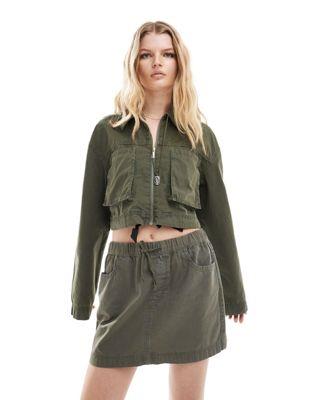 GC\X ASOS DESIGN cropped shirt with utility pockets in washed khaki co-ord fB[X