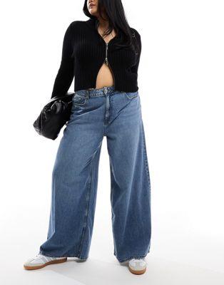 ASOS Curve  ASOS DESIGN Curve soft wide leg jean in mid blue ǥ