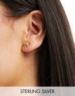 Kingsley Ryan ジュエリー イヤリング Kingsley Ryan sterling silver bow stud earrings in gold カラー:GOLD■ご注文の際は、必ずご確認ください。※こちらの商品は海外からのお取り寄せ商品となりますので、ご入金確認後、商品お届けまで3から5週間程度お時間を頂いております。※高額商品(3万円以上)は、代引きでの発送をお受けできません。※ご注文後にお客様へ「注文確認のメール」をお送りいたします。それ以降のキャンセル、サイズ交換、返品はできませんので、あらかじめご了承願います。また、ご注文をいただいてからの発注となる為、メーカー在庫切れ等により商品がご用意できない場合がございます。その際には早急にキャンセル、ご返金いたします。※海外輸入の為、遅延が発生する場合や出荷段階での付属品の箱つぶれ、細かい傷や汚れ等が発生する場合がございます。※商品ページのサイズ表は海外サイズを日本サイズに換算した一般的なサイズとなりメーカー・商品によってはサイズが異なる場合もございます。サイズ表は参考としてご活用ください。Kingsley Ryan ジュエリー イヤリング Kingsley Ryan sterling silver bow stud earrings in gold カラー:GOLD