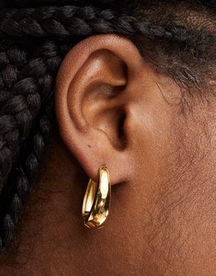 エイソス エイソス ASOS DESIGN waterproof stainless steel hoop earrings with oval design in gold tone レディース
