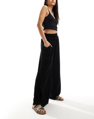 エイソス ASOS DESIGN shirred waist wide leg trouser in black レディース