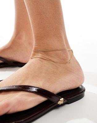 エイソス ASOS DESIGN waterproof stainless steel anklet with multirow fine snake chain design in gold tone レディース
