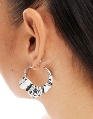 エイソス エイソス ASOS DESIGN hoop earrings with molten wave design in silver tone レディース