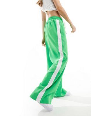 エイソス ASOS DESIGN pull on trouser with contrast panel in bright green レディース