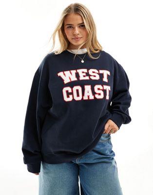 ASOS Curve エイソス ASOS DESIGN Curve oversized sweat with west coat applique graphic in navy レディース