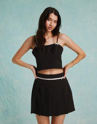 ~XZtbW Miss Selfridge pleated mini skirt with bow detail co ord in black fB[X