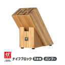 水牛工芸材料、小判型筒23。黒（天然色）・直径23×19m/m・長さ35m/m・芯持ち材。10個（セット）の価格。次の画像は使用例。日本製（小山交易株式会社自社工場製造）。ゆうメール便。