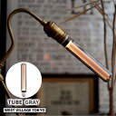 LED電球 Edison Bulb MODERN エジソンバルブ モダン E26 チューブ グレー TUBE GRAY おしゃれ＜特長＞●特殊なレーザー技術によって施されたライン加工により、まるでカーボン電球のフィラメントのような灯りを再現したLED電球です。●繊細な光の縦ラインが印象的なLED電球です。クラシカルでありながらモダンな趣は、昼も夜も洗練された空間を演出します。●明るさは抑えめで暗めの電球となっているため、眩しくない電球をお探しの方にもおすすめです。●光源が口金部分に埋め込まれており、LEDの光が直接目に入ることがないため、ずっと眺めていられる優しい灯りです。＜仕様＞◆ガラスカバーカラー:グレー◆電圧:100V◆消費電力:2.3W◆色温度:2.200K◆全光束:65LM(一般電球10W相当)◆定格寿命:15.000時間◆サイズ:3.0cmx18.5cm( E26 )■調光器について一般のご家庭や調光器が付いていない通常のオンオフスイッチにもお使いいただけます。・位相制御式、国内のLED専用調光器をご使用ください。(PWM/DMX式、デジタル制御式、そのほか一部の調光器には対応しておりません。)・全ての調光に対応するものではありません。またご使用の環境、調光器具との相性などによって調光しない場合があります。・0-100でのスムーズで完全な調光を約束するものではありません。・調光器の種類や使用負荷数によってはノイズやちらつきが発生することがあります。■中筒の傾きについて発送前に検品をしておりますが、輸送中の衝撃などにより内部の筒が斜めに傾くことがあります。傾きが気になる場合は、ガラスカバーを外して中筒を左右に押して傾きを調整してください。※こちらの電球は明るさを抑えた電球です。お部屋のメイン照明としては明るさが十分に確保できませんのでご注意ください。※電球のみの販売です。その他の器具は別でお買い求めください。。LED電球 Edison Bulb MODERN エジソンバルブ モダン E26 チューブ グレー TUBE GRAY おしゃれ