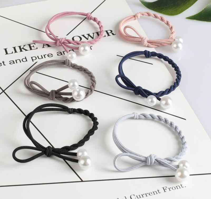 ・カテゴリ: ヘッドドレス・主な素材: プラスチック、樹脂・加工技術: ハンドメイド・デザイン要素: パール、ツイスト・スタイル: 結び目ヘアゴム