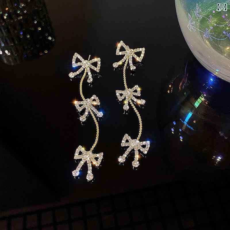 ピアス 大人かわいい レディース アクセサリー オールシーズン リボン タッセル 耳...