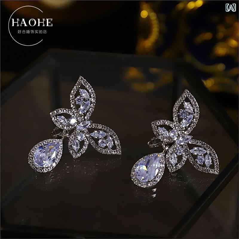 イヤーアクセサリー 豪華感 上品 エレガント 煌びやか バタフライ モチーフ 蝶 ブライダル ウェディング パーティー