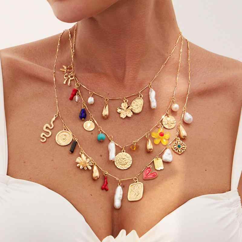 ネックレス レディース 欧米風 ボヘミアン 重ね付け 多層 唐辛子 向日葵 ハート フェイクパール アクリ..