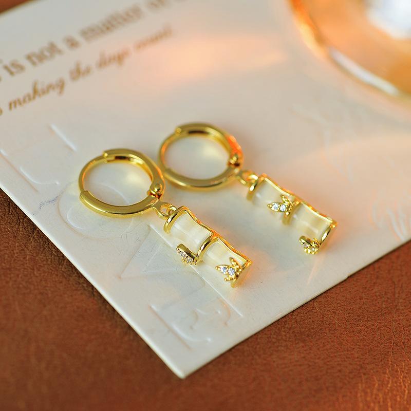 ピアス レディース 女性用 揺れる ドロップピアス バンブー フラワーモチーフ キャッツアイ 個性的 ユ..