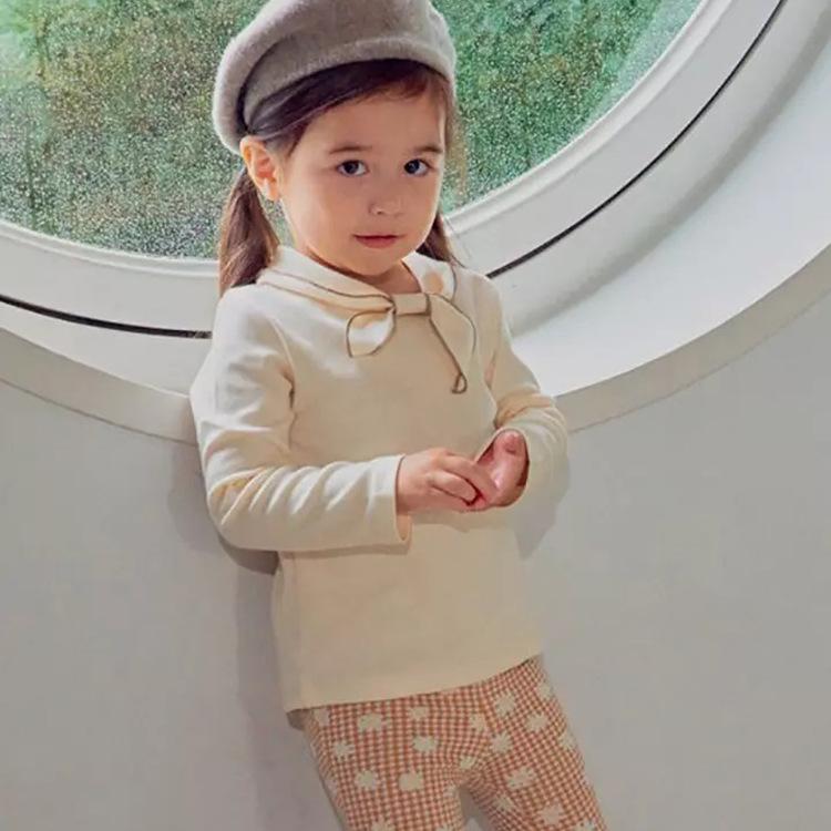 ・カテゴリ: ベビーTシャツ・性別: 女の子・対象年齢: 1～3歳・スタイル: 韓国風・袖丈: 長袖・フード: なし・主な素材: 綿95%・生地加工: 柔らか加工・柄: 無地・デザイン要素: かわいい、リボン・機能: 吸湿速乾・安全基準: A類・カラー展開: クリーム、ブラウン・サイズ展開: 73cm、80cm、90cm、100cm