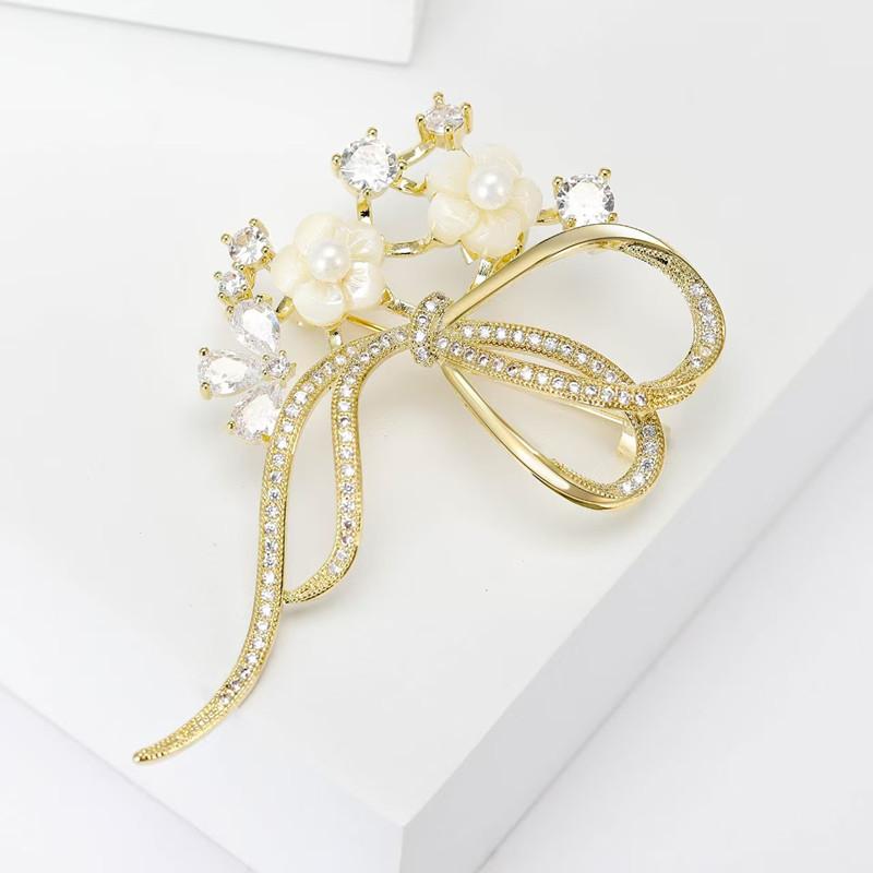 ブローチ ユニセックス ジルコニア ゴールド 電気メッキ加工 シェル 貝殻 リボン 蝶モチーフ フラワーモチーフ エレガント 上品 繊細 個性的 ジャケット スーツ フォーマル 結婚式 卒業式 入学式 通勤 オフィス