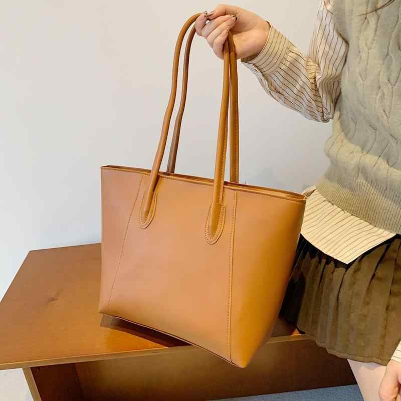・カラー展開: ブラック、ホワイト、コーヒー・スタイル: アーバンミニマリスト・主な素材: PU・バッグスタイル: トートバッグ・バッグサイズ: ミドル・流行要素: ステッチ・裏地素材: ポリエステル・バッグ形状: 横型スクエア・開閉方式: ファスナー・内部構造: ファスナーポケット・硬さ: ミドル・外ポケット: 立体ポケット・ショルダーストラップ: シングル・適用シーン: 日常使い