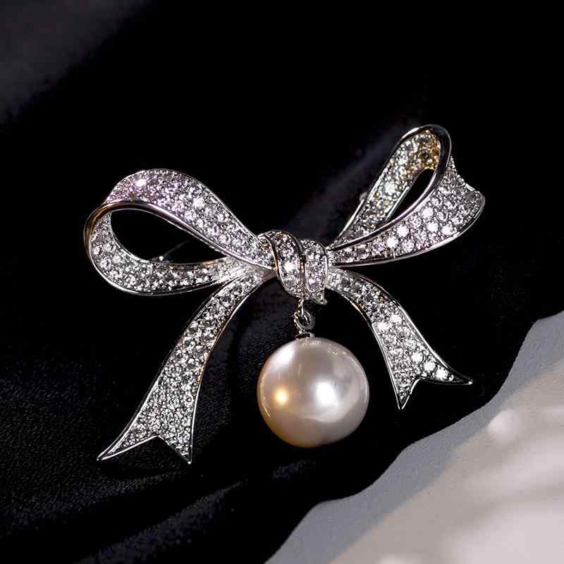 ブローチ レディース 高級感 ジルコニア リボン フェイクパール スイングチャーム 上品 エレガント 韓..