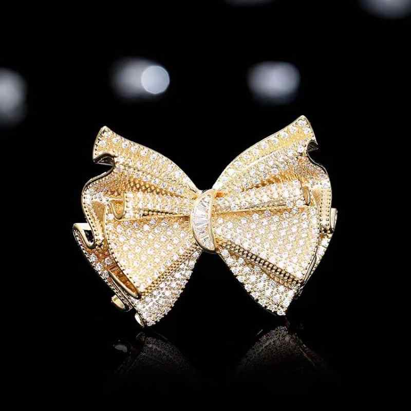 ブローチ レディース 精巧なマイクロセッティング ジルコニア リボンモチーフ 高級感 デザイナーズ ラ..