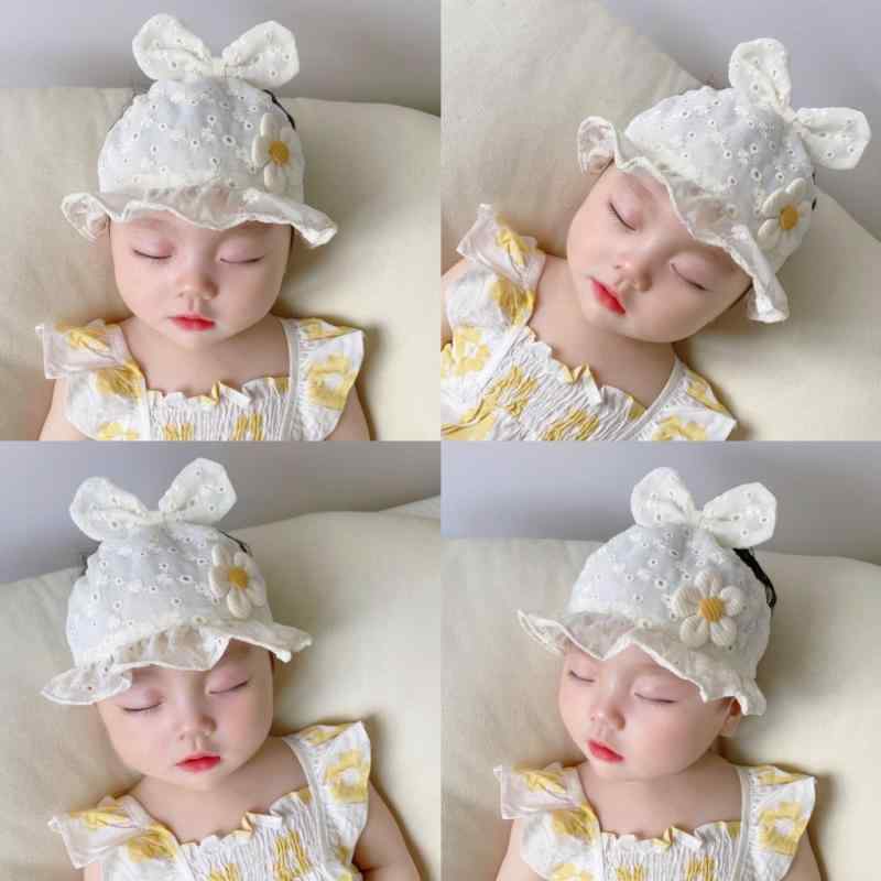 ・カテゴリ: サンバイザー・カラー展開: ベージュ, ピンク, ホワイト・つばのスタイル: ショートブリム・帽子のトップスタイル: オープントップ・主な素材: 綿 81-95%・対象年齢: 0-6ヶ月, 6-12ヶ月・スタイル: フレッシュ＆スイート・トレンド要素: 植物・花柄, 蝶々結び