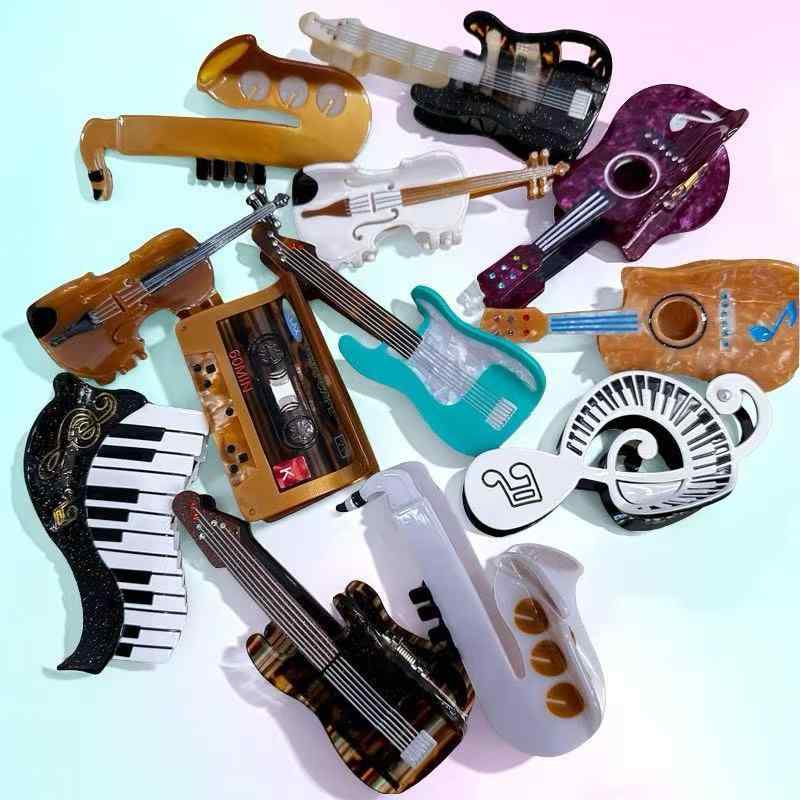 バンスクリップ レディース Y2K ミニ ピアノ ギター サックス カセットテープ 音楽モチーフ アセテート..