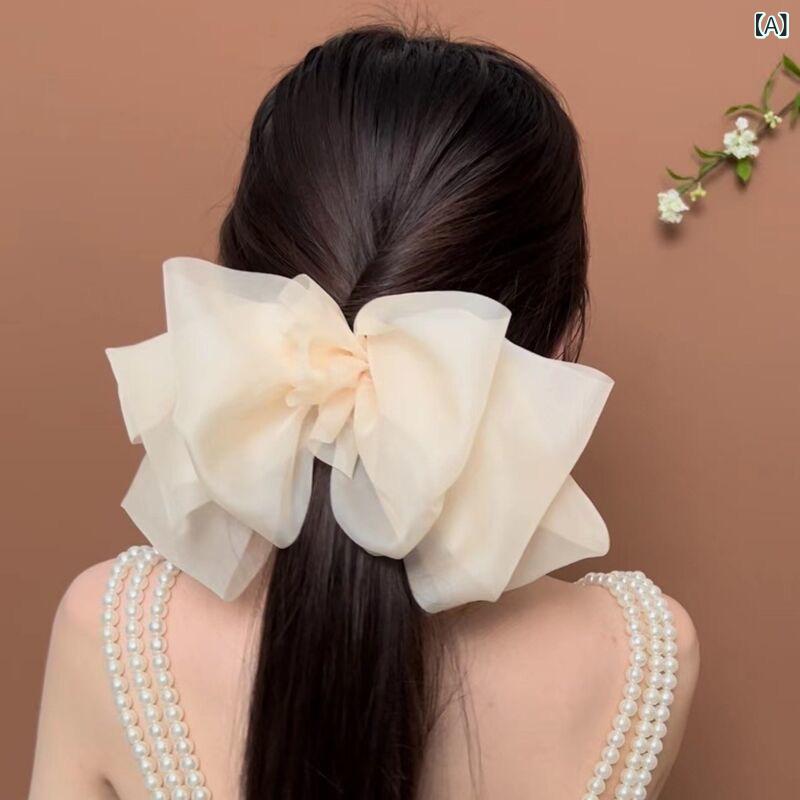 ・カテゴリ: ヘアアクセサリー・スタイル: 韓国風・スタイル分類: 清新甘美・素材: 布・対象: 女性・デザイン: 蝶結・種類: スプリングクリップ・カラー展開: ベージュ、黒、ブラウン、ピンク、ライトグレー