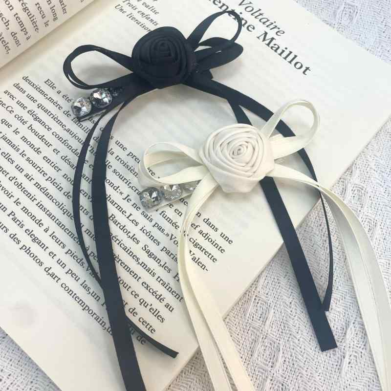 ・素材: 布・加工: 手作り・ヘアクリップ種類: サイドクリップ・カラー展開: ブラック、ホワイト・デザイン要素: 花柄・スタイル: 韓国風・スタイル分類: フレッシュスイート・カテゴリ: ヘアアクセサリー・対象: レディース・デザイン要素...