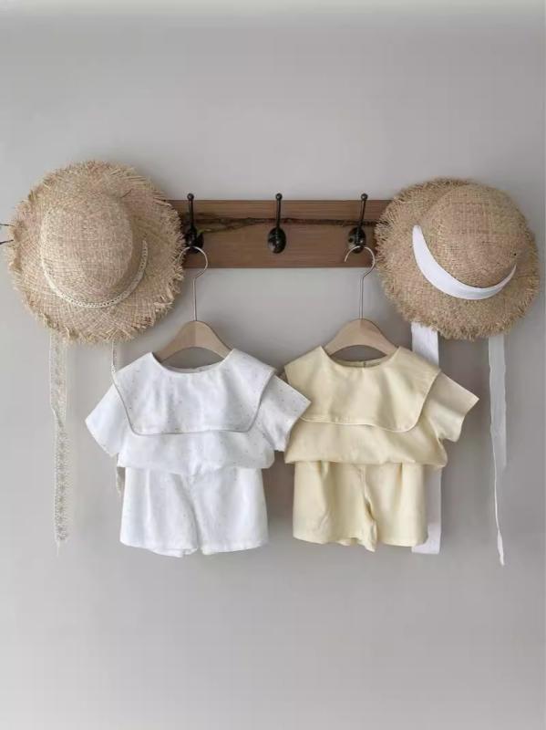 ・カテゴリ: 子供服セット・性別: 女の子用・スタイル: 韓国風・セット種類: パンツセット・セット点数: 2点セット・対象年齢: 1〜3歳・袖丈: 半袖・フード: なし・パンツ丈: ショートパンツ・生地加工: 柔軟加工・厚さ: 薄手・柄: 無地・主な素材: 綿100%・安全基準: A類・開閉方式: プルオーバー・カラー展開: ホワイト、ライトアプリコット・サイズ展開: 73cm, 80cm, 90cm, 100cm
