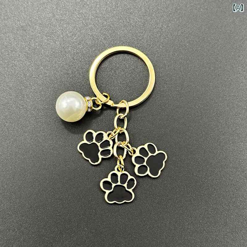 キーホルダー 猫の手 肉球 金属製 パール タッセル バッグチャーム キーリング レディース 小物 鍵 アクセサリー かわいい