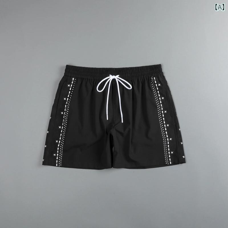 ・カテゴリ: パンツ・パンツ丈: ショートパンツ・対象: メンズ・スタイル: カジュアル、スポーツカジュアル、ヒップホップ・主な素材: ナイロン・素材の割合: ナイロン 95%、スパンデックス 5%・裏地素材: 織物（ポリエステル）・対応シーン: ランニング、フィットネス、サイクリング、スポーツトレンド・カラー展開: ブラック、ブラウン、アイボリー・サイズ展開: S、M、L、XL、2XL・機能: 速乾・ウエスト: ミドルライズ・シルエット: ルーズ