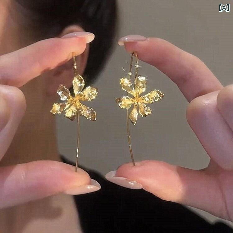 ・カテゴリ: 耳飾り・主な素材: 合金・スタイル: ファッション・通勤・デザイン: 花・処理技術: 電気メッキ・カラー展開: ゴールド、シルバー・対象: 女性・トレンド要素: 植物、花