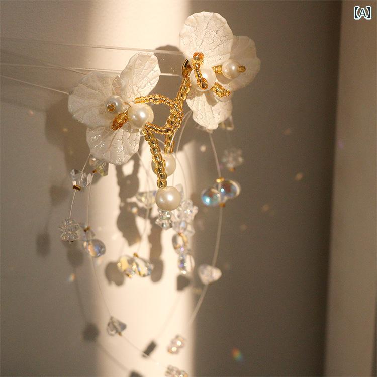 ・カテゴリ: 耳飾りりり・主な素材: 白水晶・加工技術: ハンドメイド・デザイン: 幾何学型、丸型・カラー展開: シルバーポスト、ピアス・スタイル: キュート風、フレッシュ・スイート・ターゲット: 女性