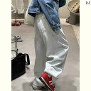 デニム レディース デニムパンツ 2025年春の新作で、デザイン感と広めの脚幅が特徴の、ハイウエストでゆったりとしたシルエットの大きいサイズの牛革風カウガールジ...