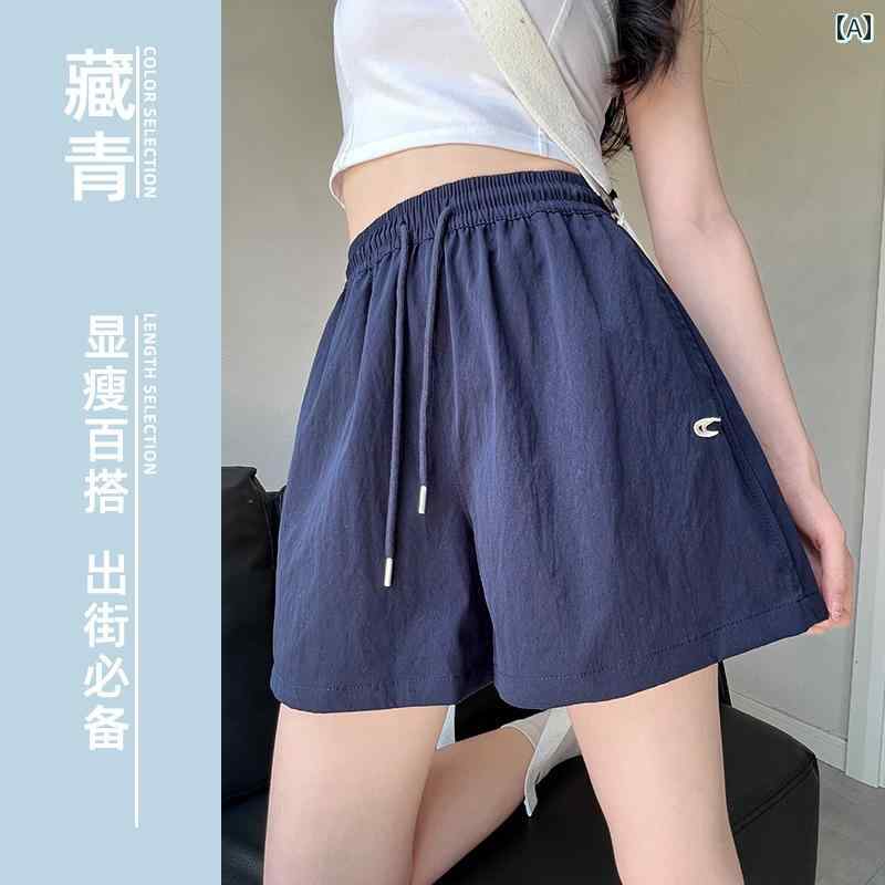 ショートパンツ レディース ブルーの 刺繍入り オーバー オール、 レディース 夏 2025 新作、 ハイ ウエスト、 ゆったり A ライン、 アメリカン 速 乾 スポーツ ショーツ