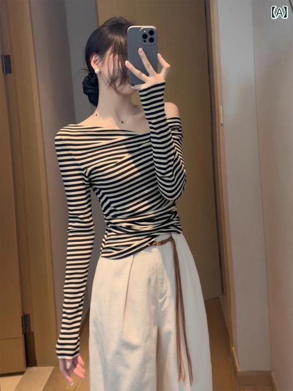 オフショルダー ロングスリーブ レディース トップス 初秋の レトロな 甘い ホット ガールの コント ラスト カラーの ストライプ 斜めの 肩の 底 シャツ 女性の インナーウェア デザイン センス ショルダー ウエスト ロングスリーブ トップ