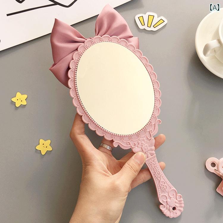 小型ミラー 手持ち かわいい 弓型の 女の子用 クリエイティブ ハンドル 化粧 鏡、 手持ち 式 美容院 化粧用 小型 ミラー、 ポータブル ポータブル ミラー
