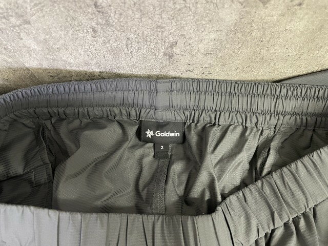 【中古】25SS GOLDWIN ゴールドウィン PERTEX EQUILIBRIUM Wind Pants パーテックス クイリブリウム ウィンド パンツ グレー 2 33921736