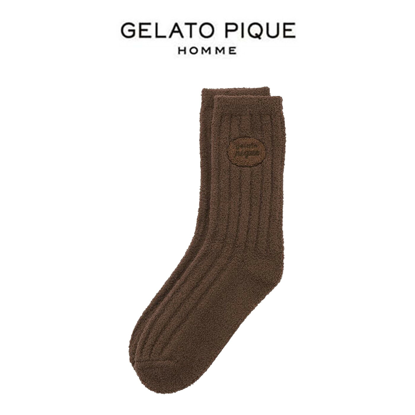 GELATO PIQUE HOMME ジェラートピケ オム ルームウェア 通販 Valentine アランソックス pmgs261518 ジェラピケ バレンタイン靴下 ルームソックス メンズ 部屋着 男性用 セレクト雑貨ムー 【商品キーワード】 ★gelato pique ソックス★ メーカー希望小売価格はメーカー商品タグに基づいて掲載していますGELATO PIQUE HOMME (ジェラートピケ オム) Valentine アランソックス pmgs261518 ■素　材■ 本体:ポリエステル94%、ナイロン4%、ポリウレタン2%/(ゴム糸除外)/モチーフ部分:アクリル100%/刺しゅう部分:ポリエステル100% ■サイズ■ FREE：サイズ対応(目安):25～27cm,高さ(かかと縫い目～履き口まで):23.5cm ※サイズ表記について商品によって同サイズや同色等であっても各商品毎に誤差がある為、 サイズ表記はあくまでも目安としてご参照ください。 ■　色　■ BRW(ブラウン) ■詳　細■ 【Valentine’s Day・アイスサンド風の刺繍入りリブソックス】 【Design/Styling】 アイスやベアなど、gelato piqueらしいスウィートなモチーフを散りばめた2026年のバレンタインコレクション。 アイスサンドをモチーフにしたサガラ刺繍をワンポイントであしらった、アラン柄のHOMMEサイズソックスです。 細めのリブで心地良いフィット感。ブランドロゴが入った特製のスリーブ付きなので、大切な方へのギフトにもおすすめです。LADIES’サイズとのペア・コーディネートも可能。いつもと同じ日常の中で、自分だけの特別なバレンタイン気分をお楽しみください。 ※照明の関係により、実際よりも色味が違って見える場合があります。 またパソコン・スマートフォンなどの環境により、 若干製品と画像のカラーが異なる場合もございます。 予めご了承ください。 商品の色味は、商品単品画像をご参照下さい。 ※商品画像はサンプルのため、色味やサイズ等の仕様に変更がある場合がございますので、 予めご了承ください。