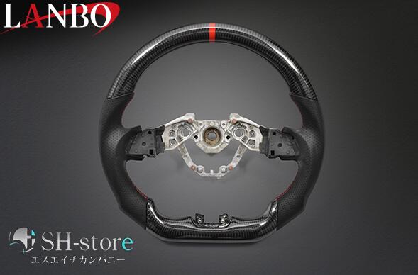 樂天商城 - ランボ LANBO プレミアムスポーツステアリング ウェットカーボン×リアルパンチングレザー E26 キャラバン 2021/11(R3/11)～