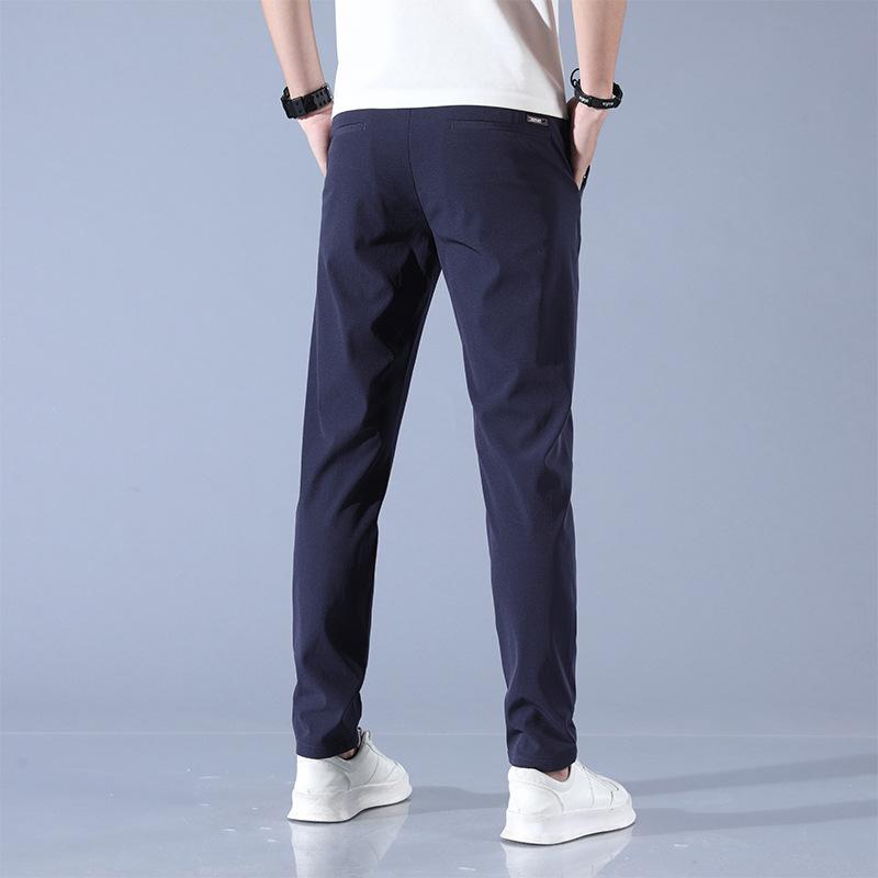 ・項目: カテゴリ・値: ビジネス＆カジュアルパンツ・項目: スタイル・値: ビジネス通勤・項目: 対象・値: 24～35歳の都市部・項目: デザイン・値: 基本・項目: パンツ型・値: ストレート・項目: パンツ丈・値: フルレングス・項目: ウエスト・値: ミドルウエスト・項目: ベルト・値: なし・項目: 留め具・値: 紐・項目: 厚さ・値: 薄手・項目: 柄・値: 無地・項目: 対象・値: 青年・項目: 生地・値: 化繊混紡・項目: 主素材・値: ナイロン 86.5%・項目: シーン・値: カジュアル・項目: 裾・値: ストレート・項目: デザイン・値: リブ裾・項目: 伸縮性・値: 中程度・項目: 生地・値: ストレッチ・項目: カラー・値: ダークグレー, ブラック, ライトグレー, ブルー, カーキ, ライトグリーン・項目: サイズ・値: 28, 29, 30, 31, 32, 33, 34, 36, 38・項目: 対象・値: 大人・項目: 対象・値: 男性・項目: 機能・値: 通気性, アイロン不要