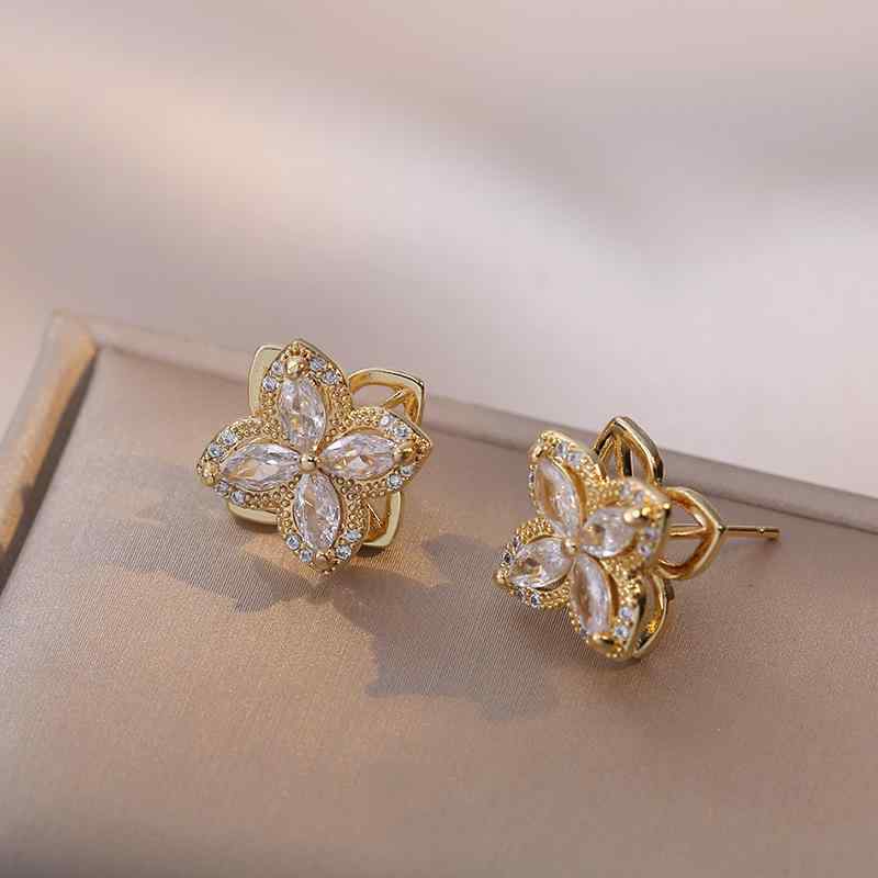 ピアス レディース 女性用 四つ葉 花 フラワー ジルコニア 回転 キラキラ 揺れる 小ぶり 韓国風 かわい..