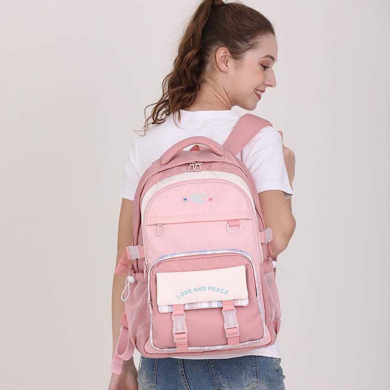 リュック レディース 大容量 バックパック ガールズ スクールバッグ 軽量 撥水 幾何学模様 ピンク系