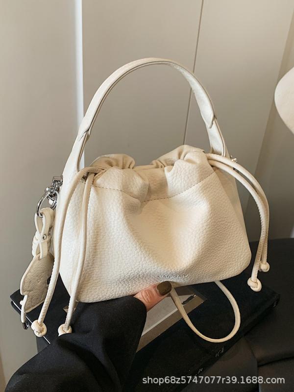 バッグ レディース ハンドバッグ ショルダーバッグ 巾着 バケツ型 PUレザー ステッチ 無地 黄色 ブラック ピンク 水色 オフホワイト