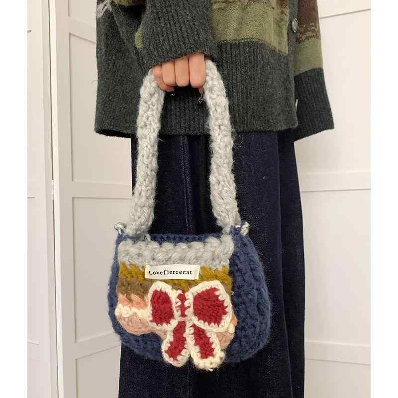 手提げバッグ レディース 秋冬 かわいい 編み込み 蝶結び ニット 斜めがけ 水桶型 鞄 蔵青色 玫红色