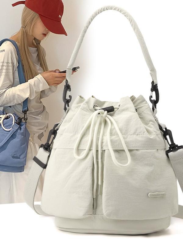 バッグ レディース 水桶バッグ 巾着型 オックスフォード 布製 肩掛け 斜めがけ 手提げ カバン マカロンカラー パステルカラー カジュアル かわいい 普段使い