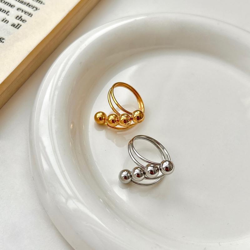 指輪 ペアリング 幾何学模様 コイル ラップ リング チタン鋼 冷淡風 エレガント ファッション 金色 銀色