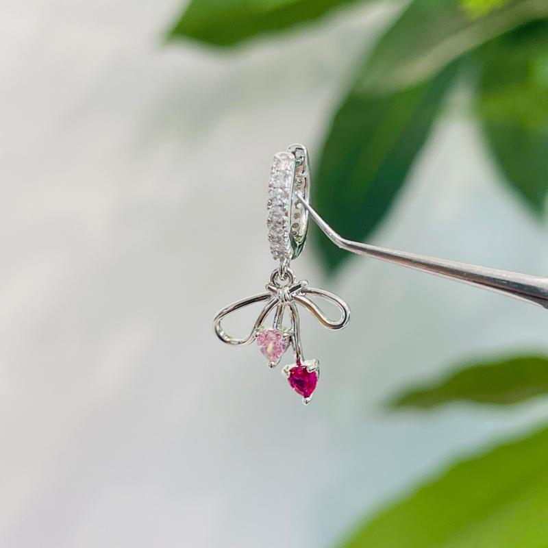 Cubic Zirconia - ピアス レディース 蝶々結び キラキラ 個性的 ins かわいい ピンク系 紫